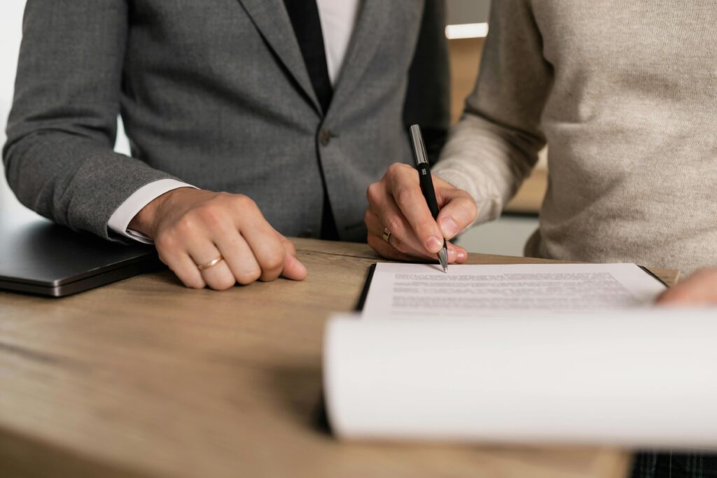 writing-signing-legal-contract-law