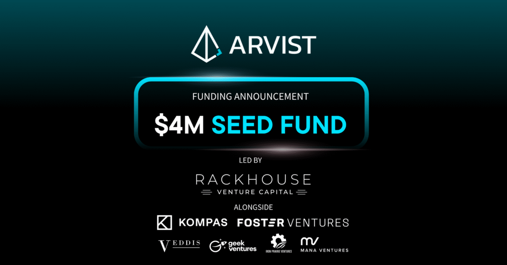 Two men smiling and posing for a photo indoors.